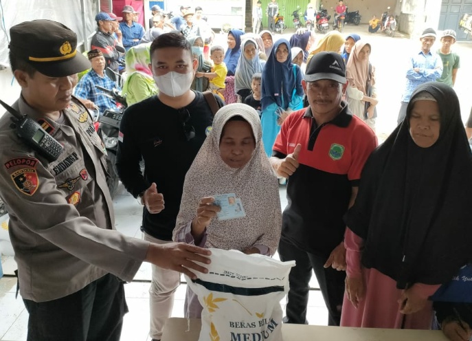 Kapolsek Tanjungsiang Monitoring Pendampingan Pendistribusian Bantuan  Ketahanan Pangan